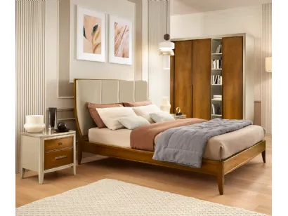 Letto Armonia in legno con testiera in pelle di Le Fablier