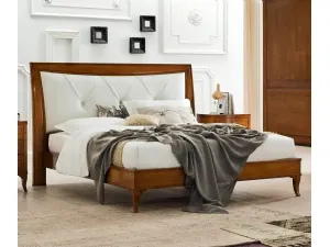 Letto Aurora in legno con testiera in pelle di Le Fablier