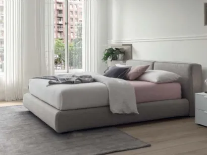 Letto con contenitore in tessuto imbottito con testiera Free di Morassutti