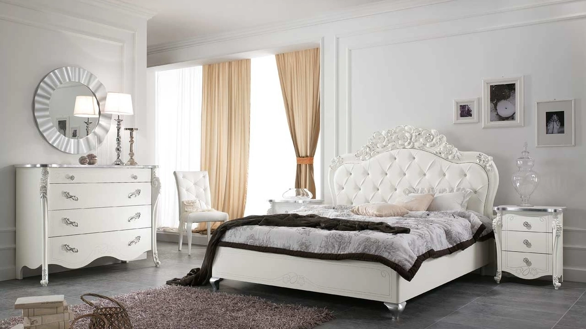 Letto con testiera in pelle trapuntata e intaglio floreale Viola di Mobil Più