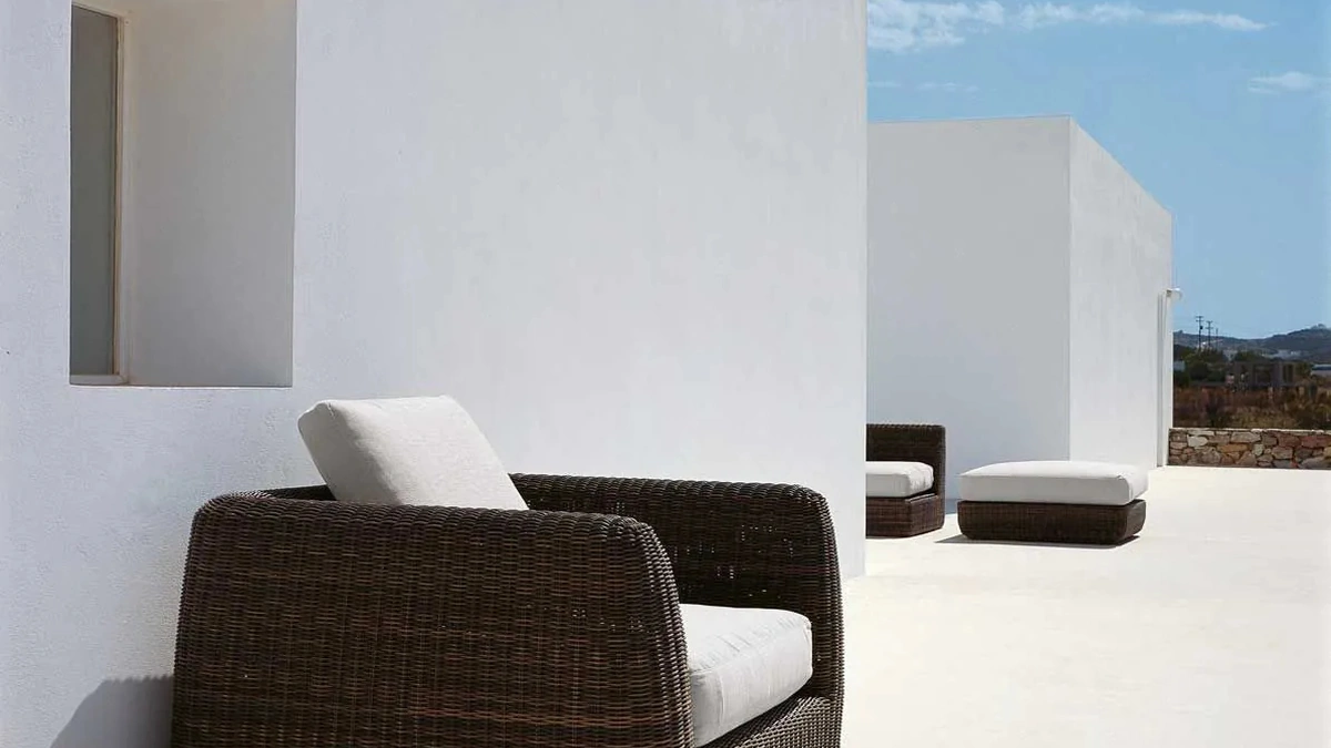 Poltrona Agorà in fibra sintetica intrecciata di Unopiu